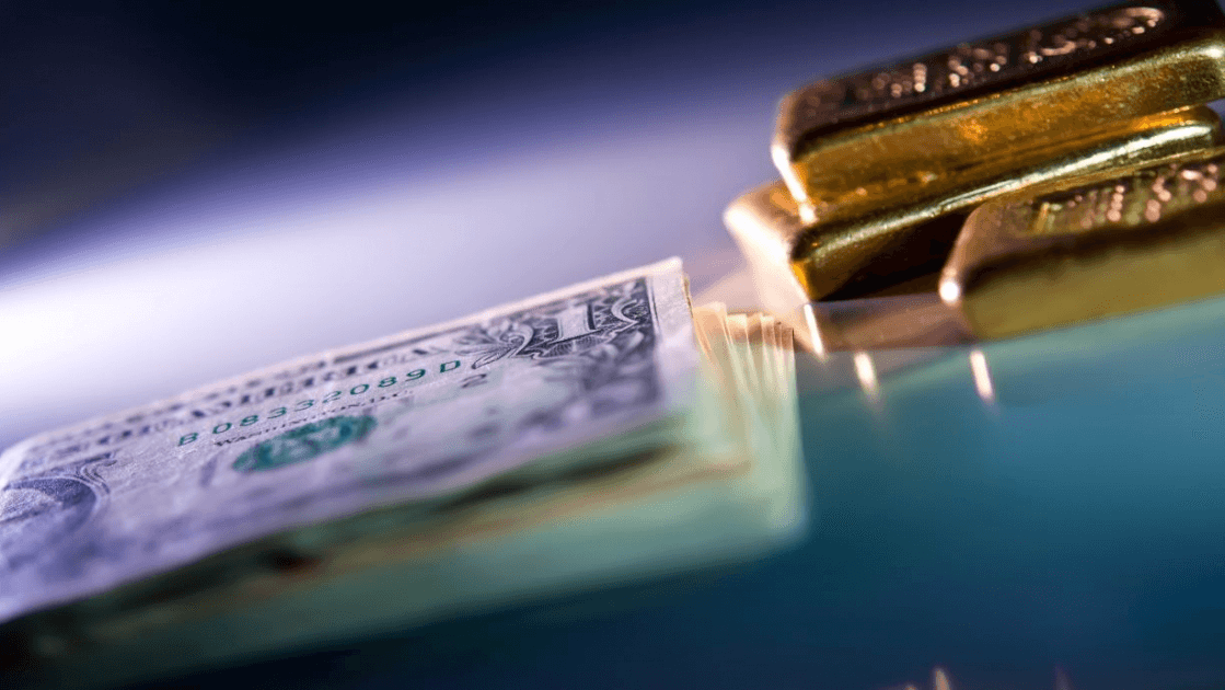 Złoto stabilizuje się, gdy dolar wycofuje się po danych o inflacji w USA